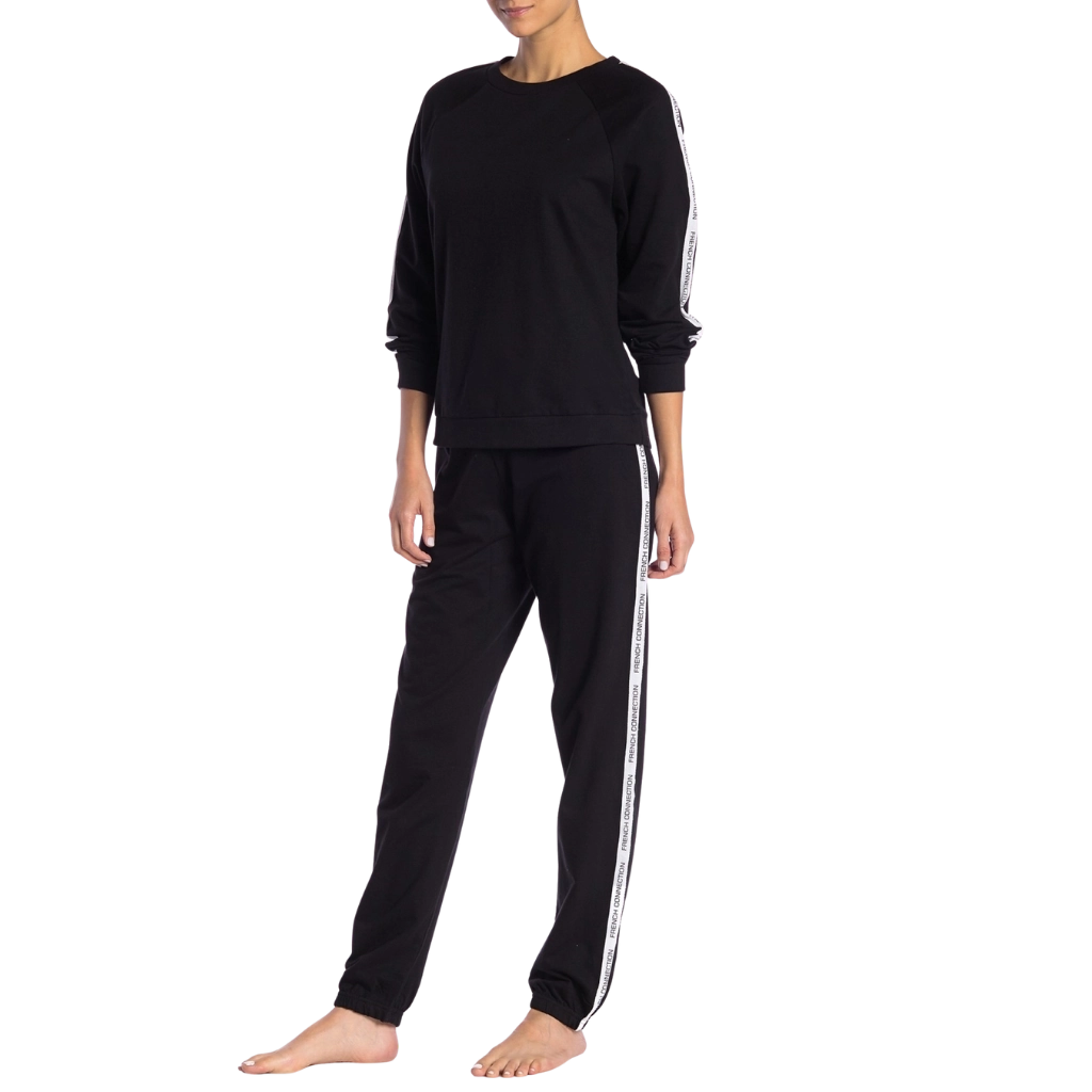 a woman in black tracksuit