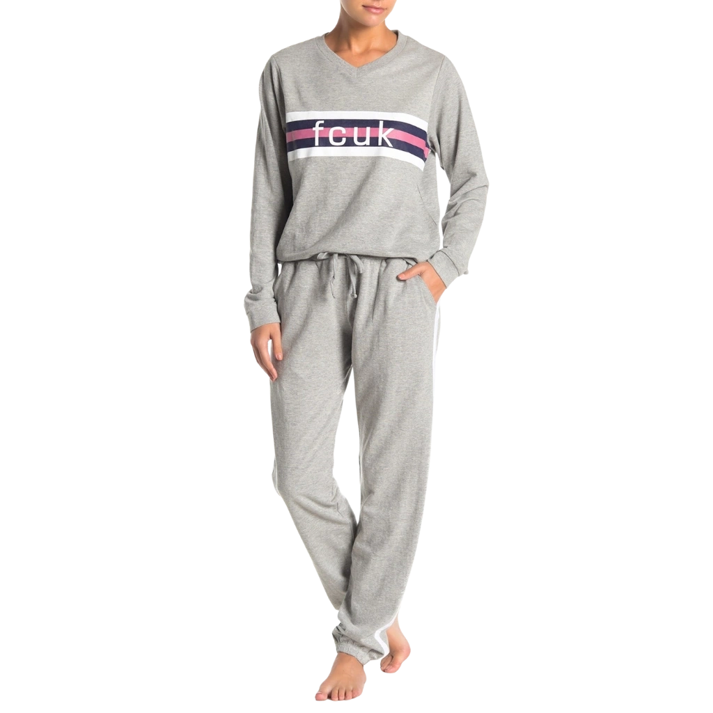 a woman wearing a grey outfit