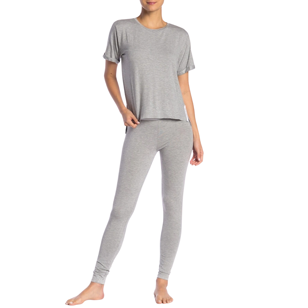 a woman wearing grey pajamas