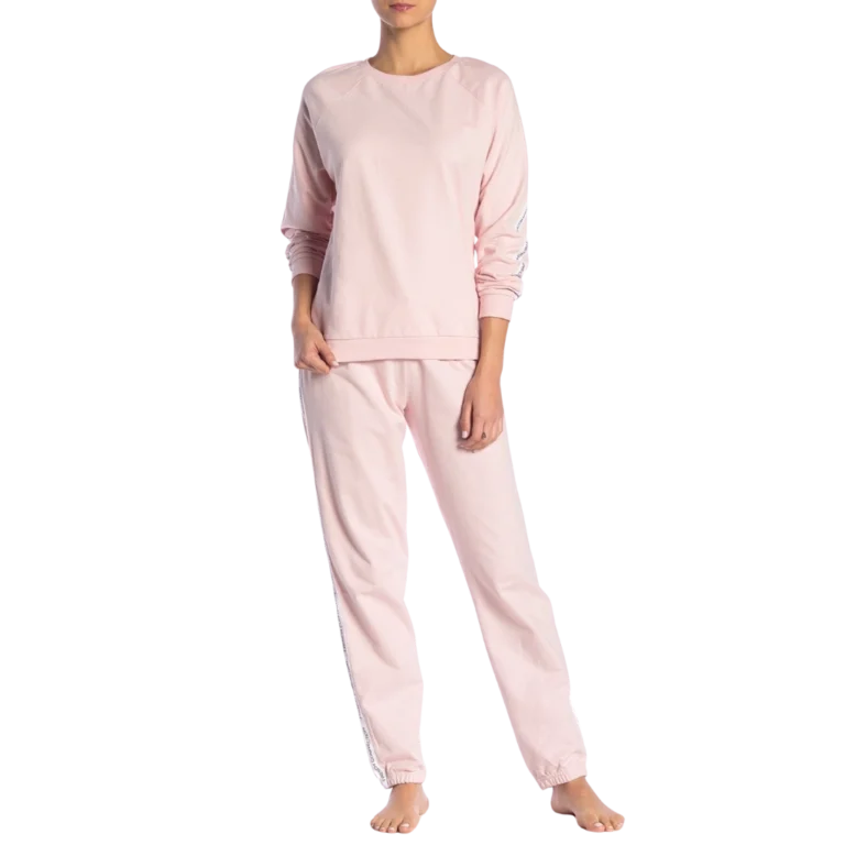 a woman wearing pink pajamas