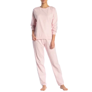 a woman wearing pink pajamas