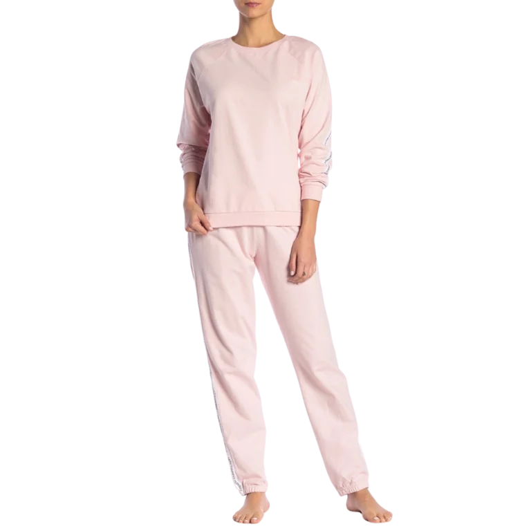 a woman wearing pink pajamas