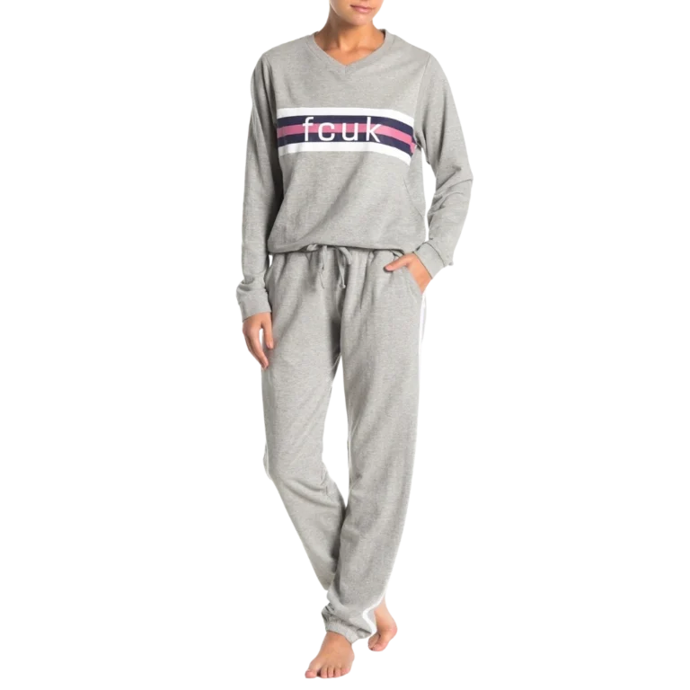 a woman wearing a grey outfit