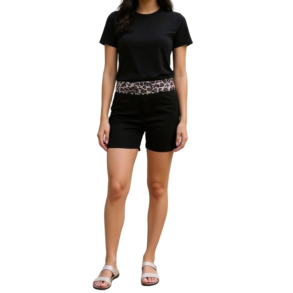 a woman in black shirt and shorts