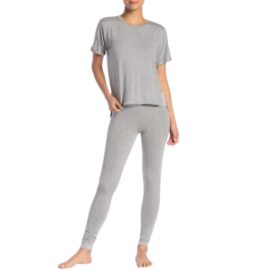 a woman wearing grey pajamas