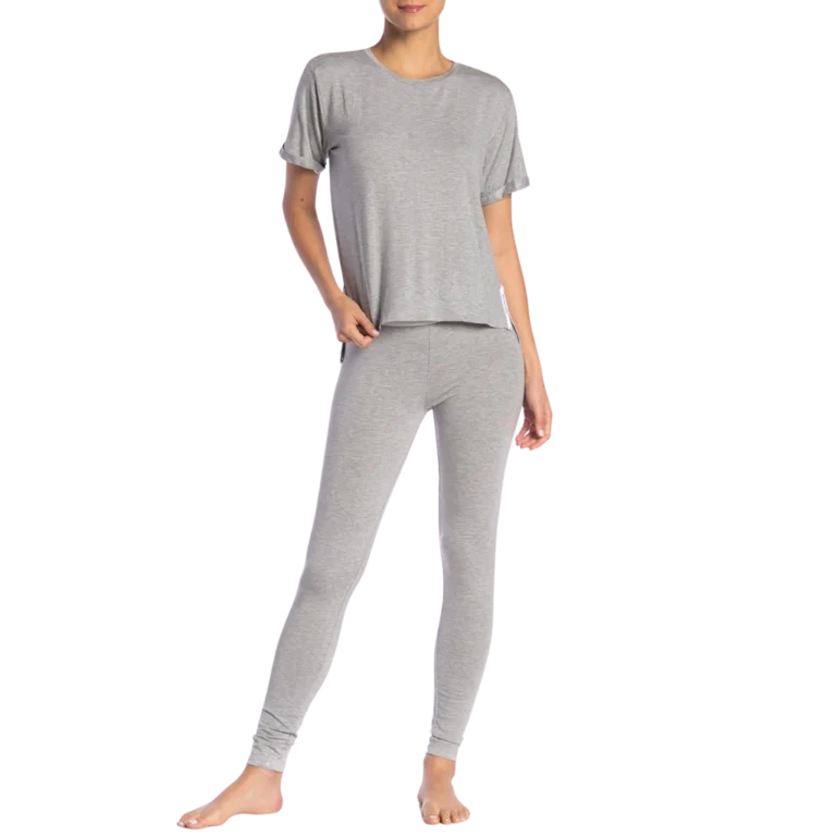 a woman wearing grey pajamas